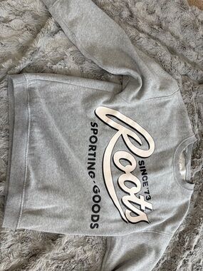 Roots Light Grey Crewneck Sweatshirt with Green Logo Patch